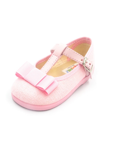 mercedita de lino para nina con un lazo en el empiene