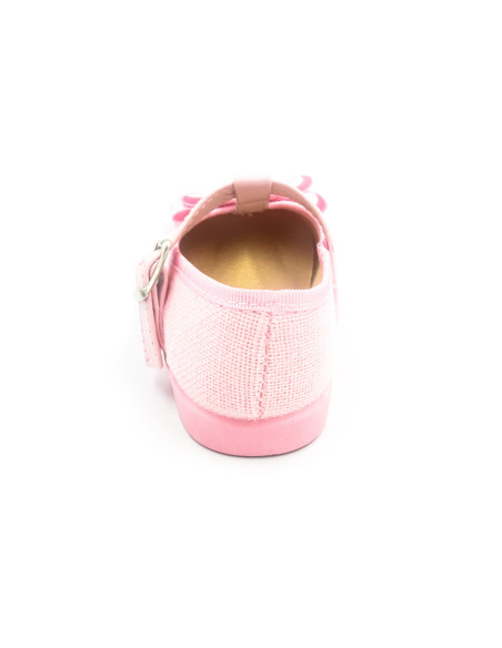 mercedita de lino para nina con un lazo en el empiene