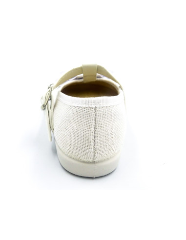 mercedita de lino para nina con un lazo en el empiene