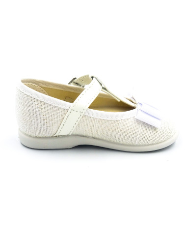 mercedita de lino para nina con un lazo en el empiene