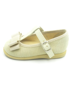 mercedita de lino para nina con un lazo en el empiene 2