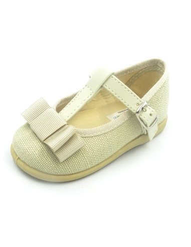 mercedita de lino para nina con un lazo en el empiene