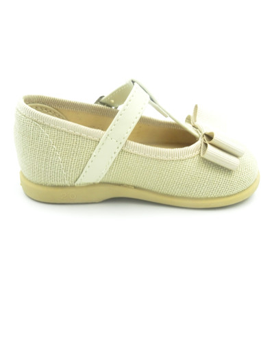 mercedita de lino para nina con un lazo en el empiene