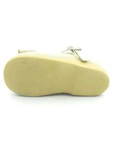 mercedita de lino para nina con un lazo en el empiene