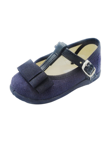 mercedita de lino para nina con un lazo en el empiene