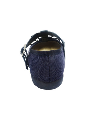 mercedita de lino para nina con un lazo en el empiene