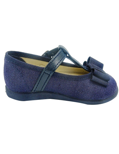 mercedita de lino para nina con un lazo en el empiene