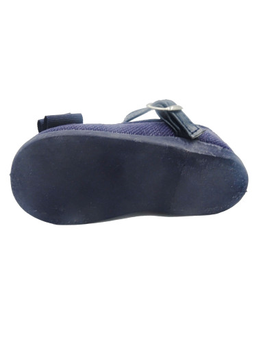 mercedita de lino para nina con un lazo en el empiene