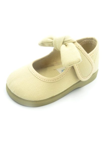 mercedita con velcro para nina con un lazo atado