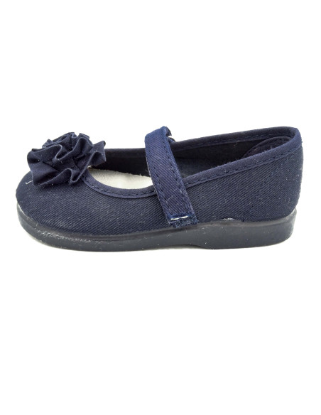 mercedita de lona para nina con una flor