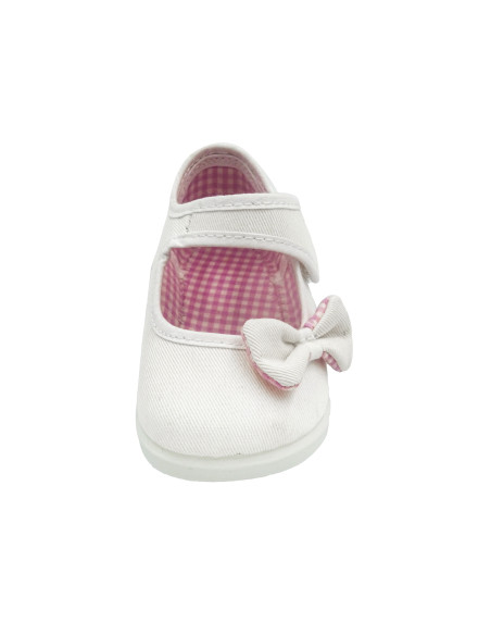 mercedita de tela para nina con un lazo de vichy en un lateral