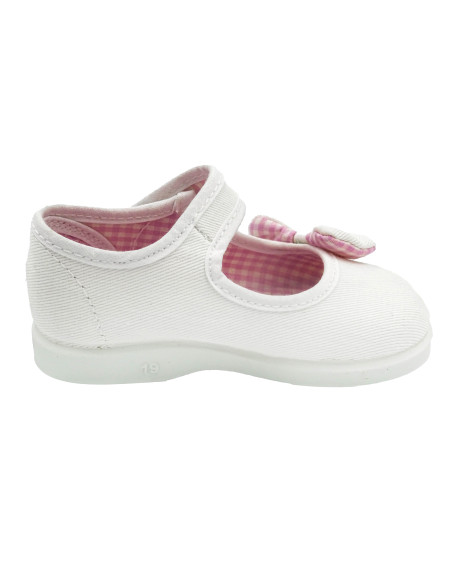 mercedita de tela para nina con un lazo de vichy en un lateral