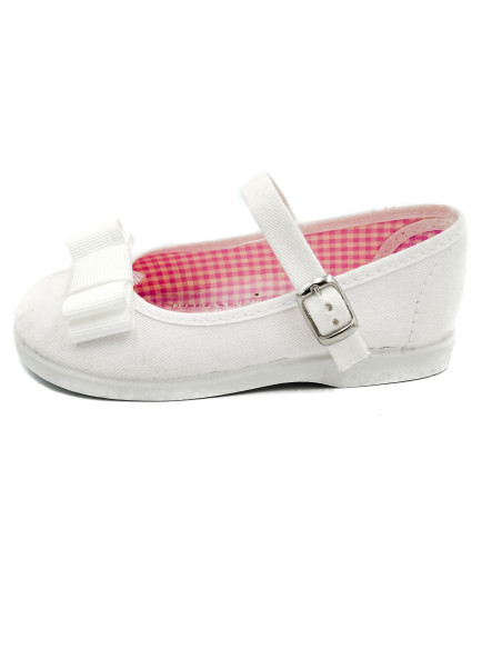 mercedita de tela con un lazo zapatero y suela de goma