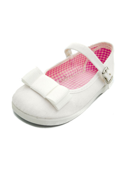 mercedita de tela con un lazo zapatero y suela de goma