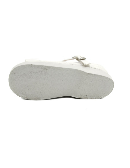 mercedita de tela con un lazo zapatero y suela de goma