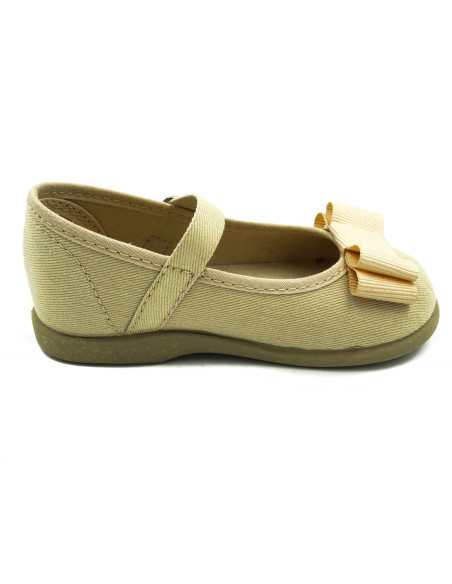 mercedita de tela con un lazo zapatero y suela de goma