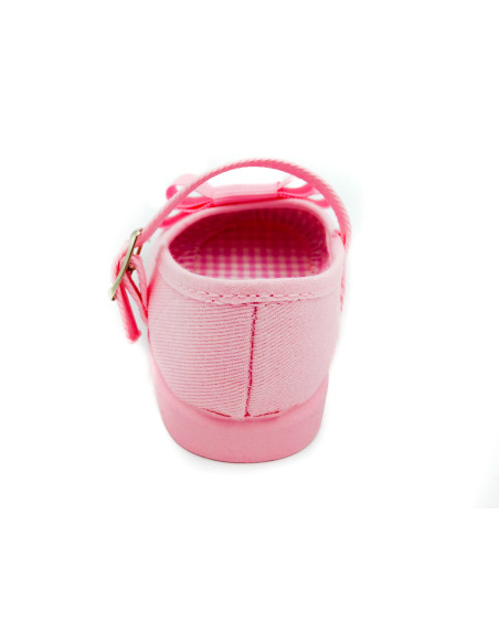mercedita de tela con un lazo zapatero y suela de goma