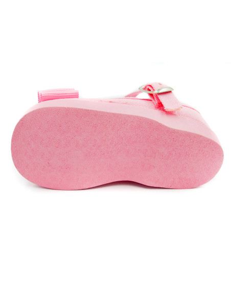 mercedita de tela con un lazo zapatero y suela de goma