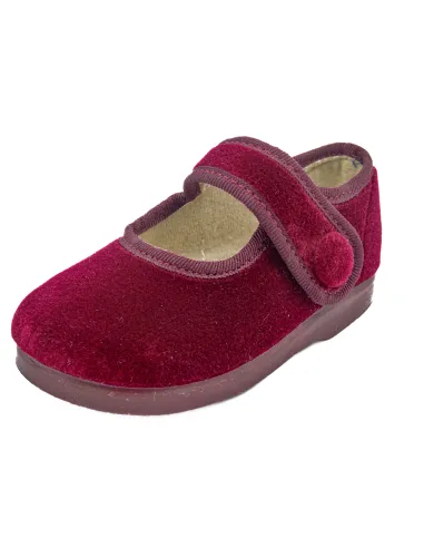 mercedita de nina con un boton de adorno