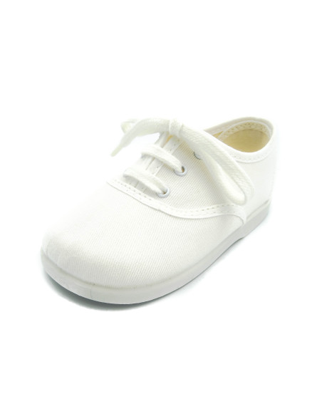 bamba de tela con los cordones al tono para nino