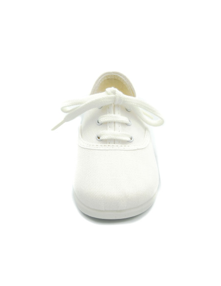 bamba de tela con los cordones al tono para nino