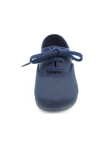 bamba de tela con los cordones al tono para nino