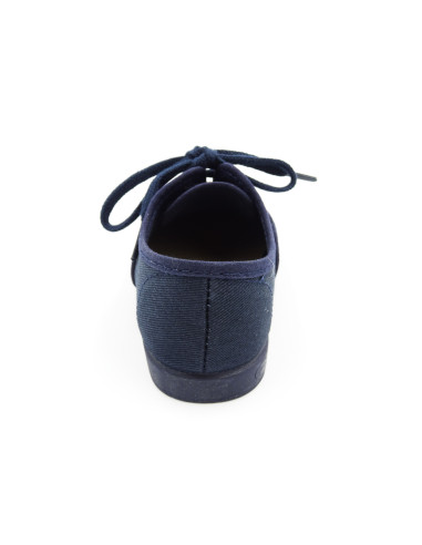 bamba de tela con los cordones al tono para nino