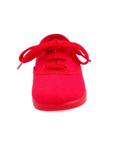 bamba de tela con los cordones al tono para nino