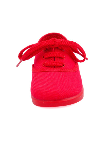 bamba de tela con los cordones al tono para nino