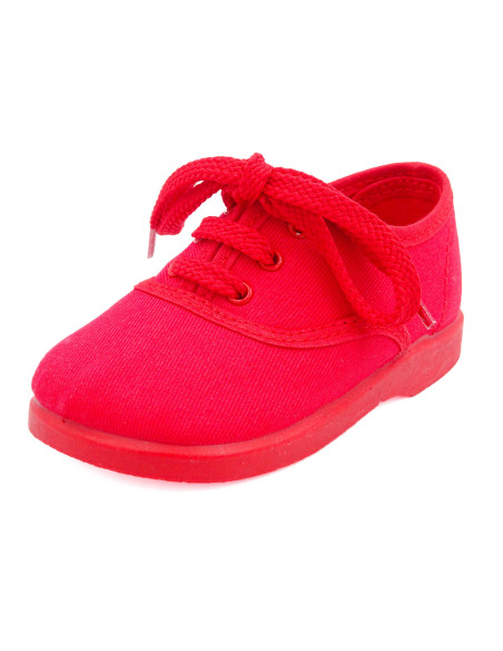 bamba de tela con los cordones al tono para nino