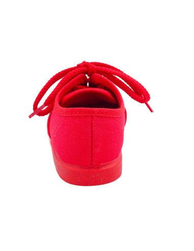 bamba de tela con los cordones al tono para nino