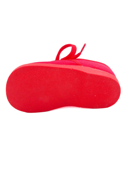 bamba de tela con los cordones al tono para nino