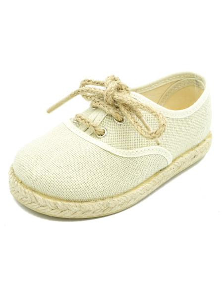 espartena de nino de lino con la suela de goma para ceremonia