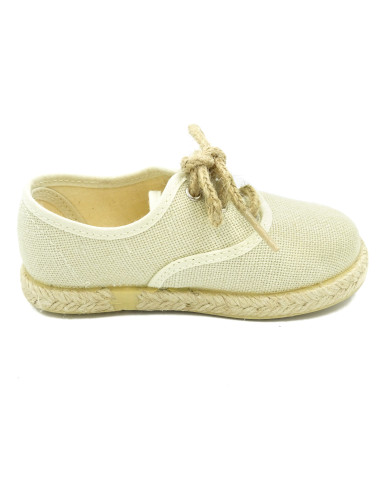 espartena de nino de lino con la suela de goma para ceremonia