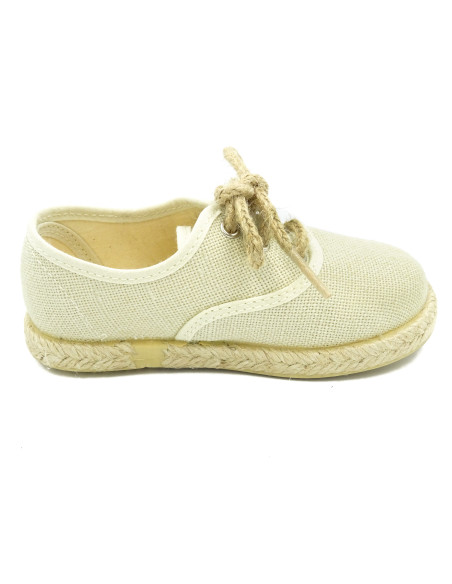 espartena de nino de lino con la suela de goma para ceremonia