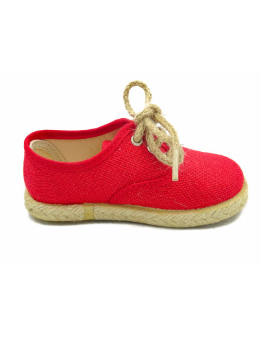 espartena de nino de lino con la suela de goma para ceremonia