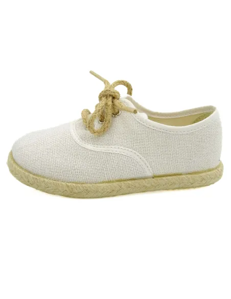 espartena de nino de lino con la suela de goma para ceremonia