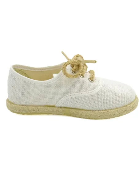 espartena de nino de lino con la suela de goma para ceremonia