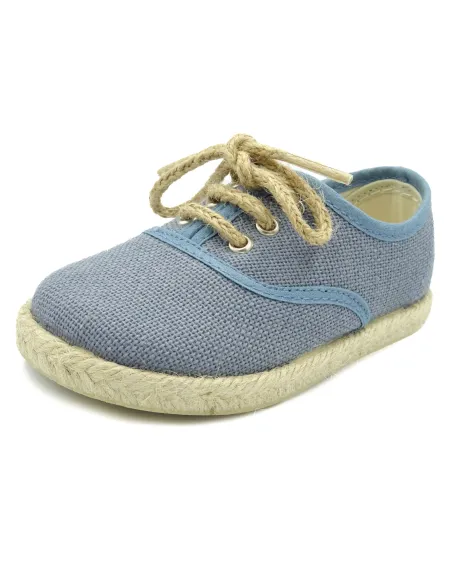 espartena de nino de lino con la suela de goma para ceremonia